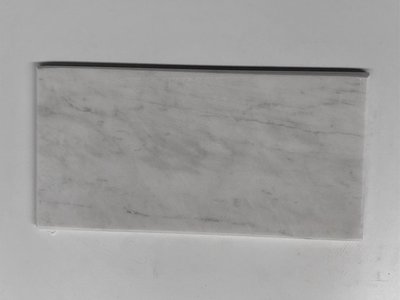 Trang trí phòng khách với đá chà cát xẻ cạnh trắng sữa 10x20cm